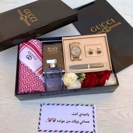 بوكس هدية للزوج يحتوي على ساعة وعطر رجالي وشماغ وكبك وقلم مع تنسيق ورد وبطاقة إهداء