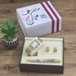 طقم هدية للزوج مع ساعة وقلم وكبك بتفاصيل ذهبية داخل بوكس